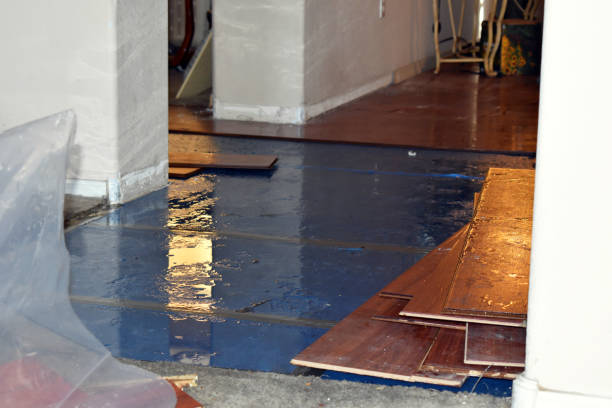Professional Storm Water Damage Restoration technician working in Fiskeville, RI